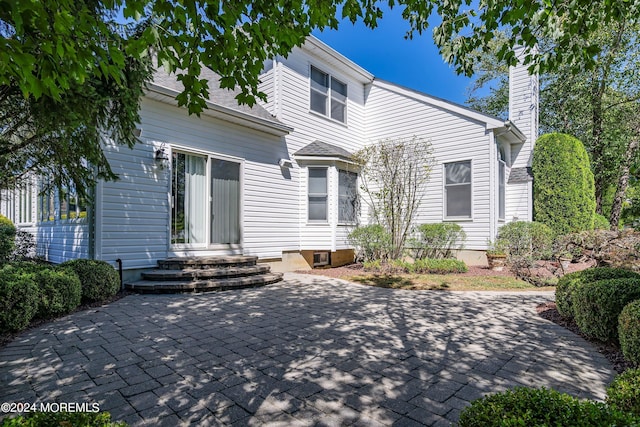 view of front of house featuring a patio