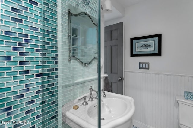 bathroom featuring sink and toilet