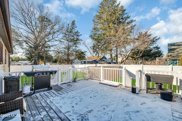 wooden terrace with area for grilling