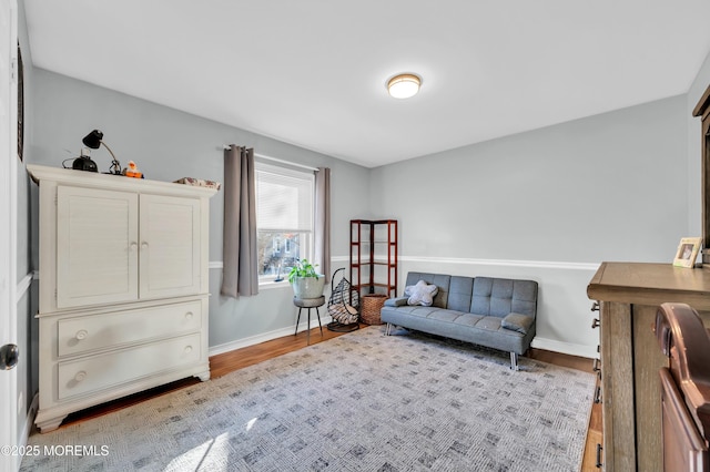 sitting room featuring light hardwood / wood-style flooring