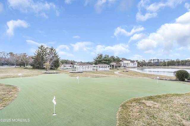 surrounding community featuring a water view