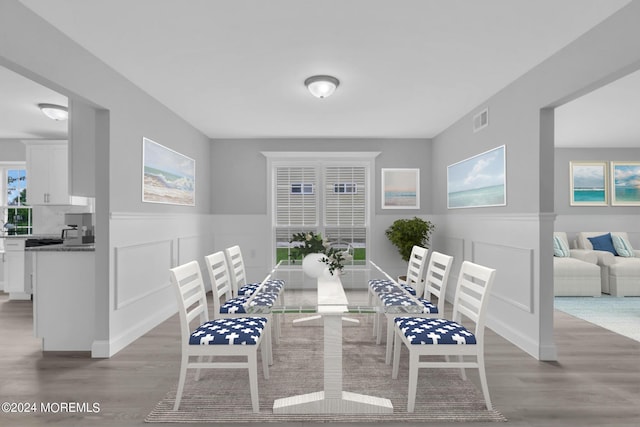 dining area featuring light wood-type flooring