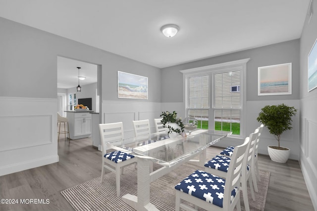 dining area featuring hardwood / wood-style flooring