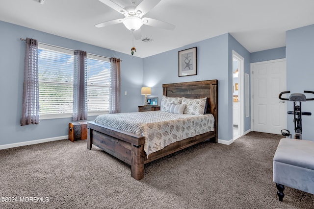 bedroom with ceiling fan and carpet floors