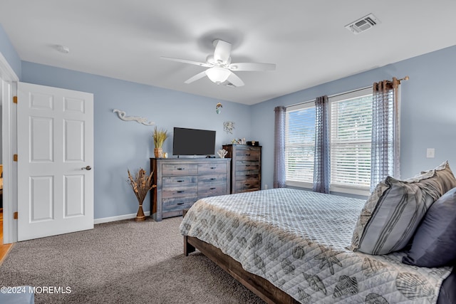 carpeted bedroom featuring ceiling fan