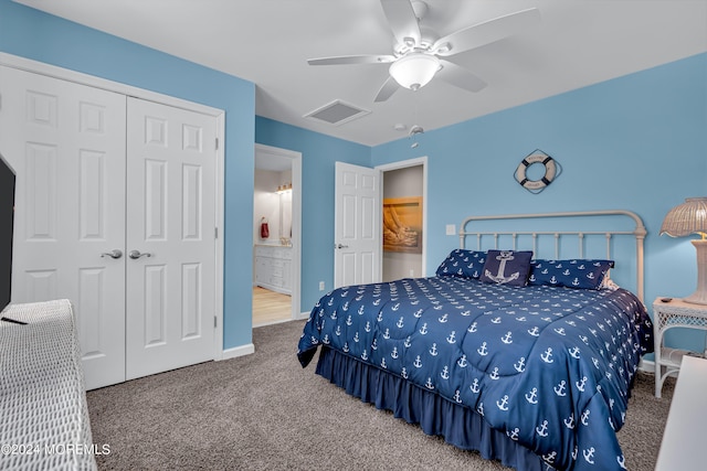 bedroom featuring ceiling fan, ensuite bathroom, a closet, and carpet flooring