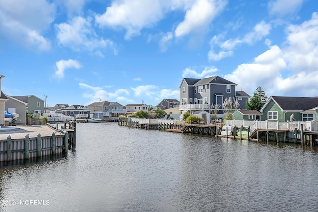 dock area with a water view