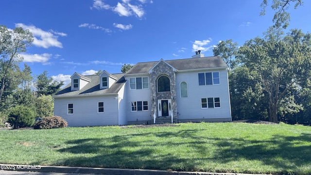 view of front facade featuring a front yard