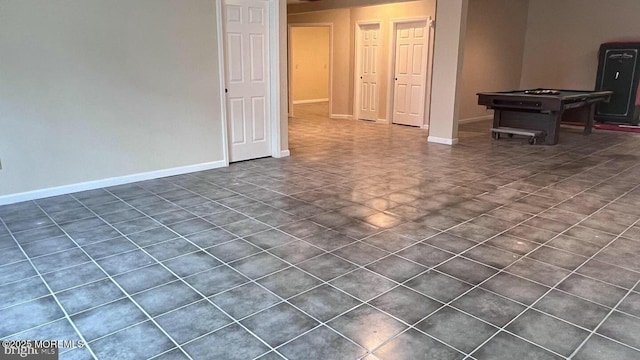 tiled spare room with pool table