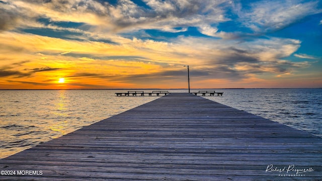 view of dock with a water view