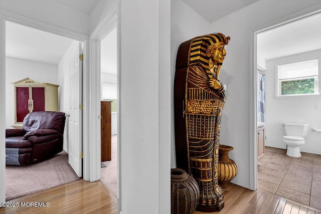 corridor featuring light hardwood / wood-style flooring