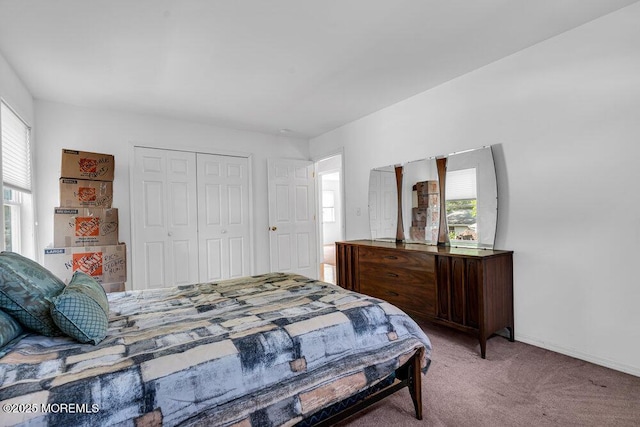 bedroom featuring a closet and carpet floors