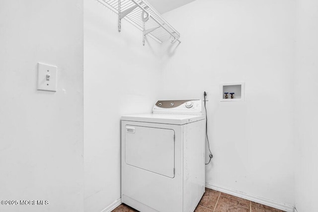 washroom featuring washer / dryer