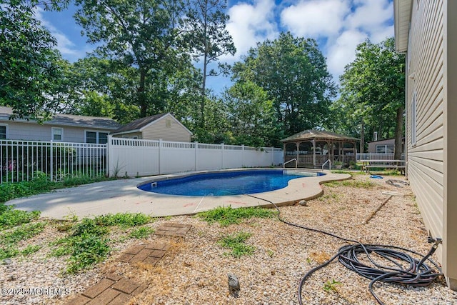 view of pool with a patio area and a gazebo