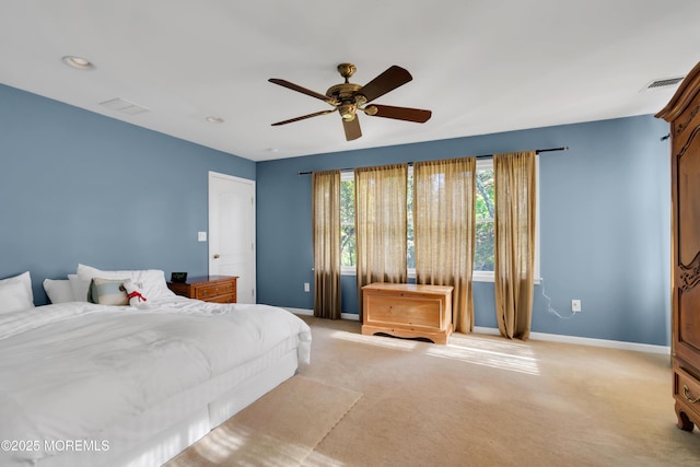 bedroom featuring ceiling fan and light colored carpet