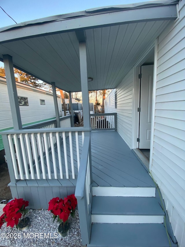 wooden deck with covered porch