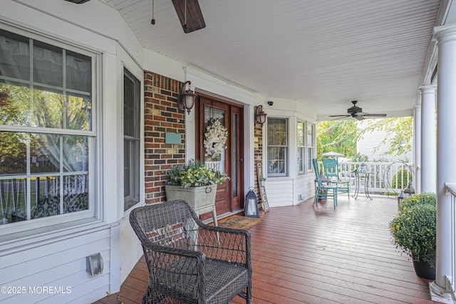 deck featuring ceiling fan and covered porch