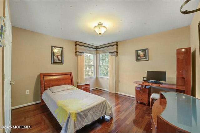 bedroom featuring dark hardwood / wood-style floors