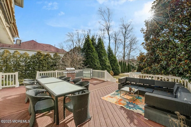 wooden deck featuring an outdoor living space