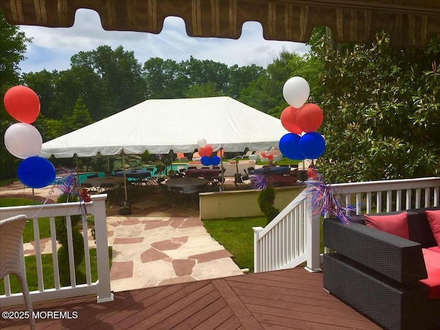 wooden deck featuring a patio