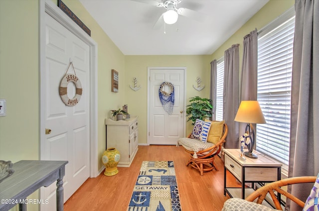 entryway with ceiling fan and light wood-type flooring