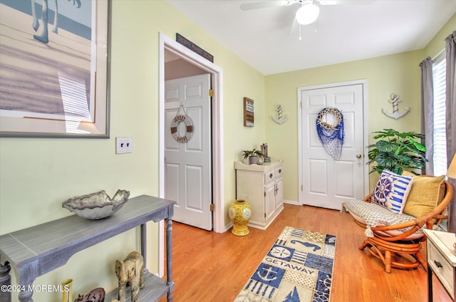 entryway featuring ceiling fan and light hardwood / wood-style floors