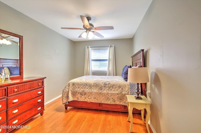 bedroom featuring light wood-type flooring and ceiling fan