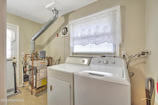 washroom featuring washing machine and clothes dryer