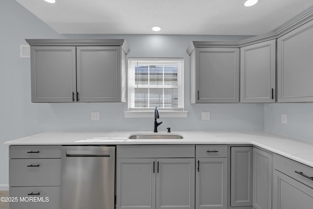 kitchen featuring gray cabinets, sink, and stainless steel dishwasher