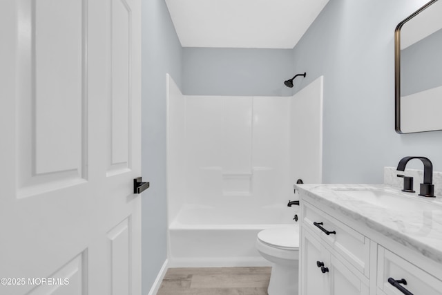 full bathroom featuring vanity, toilet, shower / bathing tub combination, and wood-type flooring