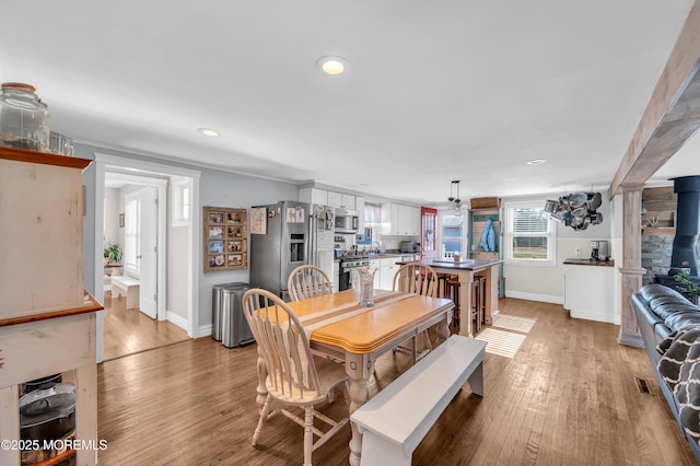 dining room featuring light hardwood / wood-style floors and sink