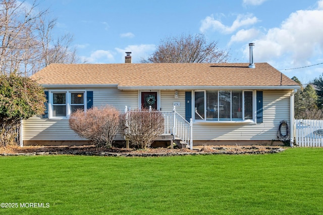 single story home featuring a front lawn