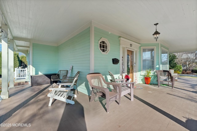 view of patio featuring a porch