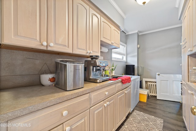 kitchen featuring backsplash, dark wood-type flooring, light brown cabinetry, radiator, and ornamental molding