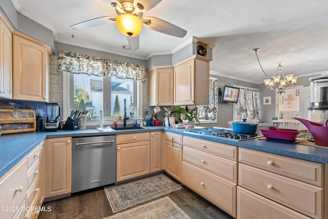 kitchen featuring crown molding, stainless steel appliances, light brown cabinetry, and dark hardwood / wood-style flooring