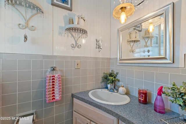 bathroom with vanity and decorative backsplash