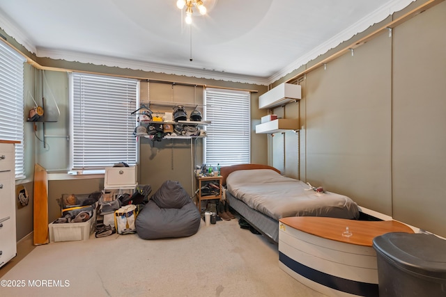 carpeted bedroom featuring ceiling fan, multiple windows, an AC wall unit, and crown molding