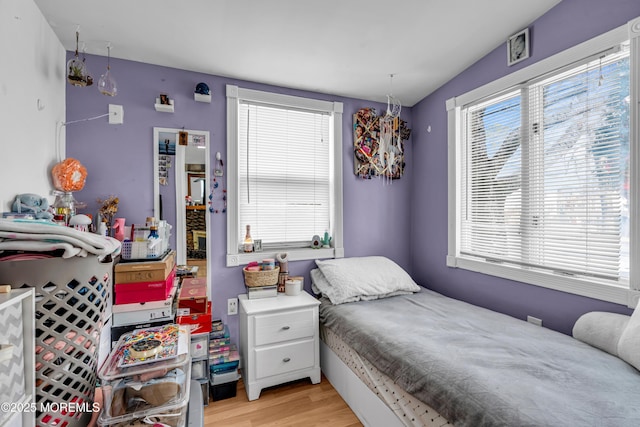 bedroom with light wood-type flooring