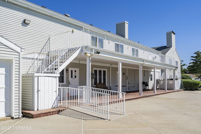 back of house featuring a patio