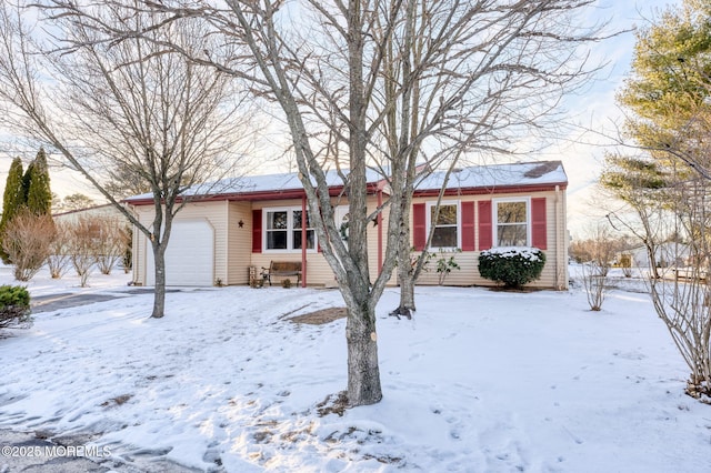 single story home with a garage