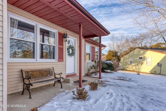 view of snow covered patio