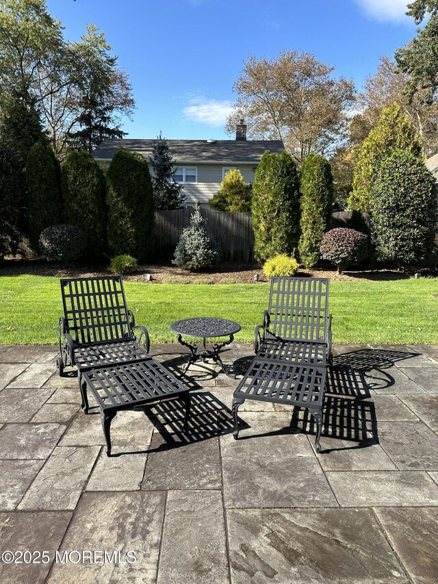 view of patio / terrace with fence