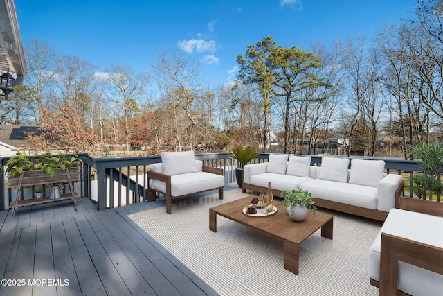 wooden terrace with outdoor lounge area