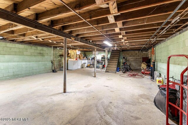 basement with separate washer and dryer