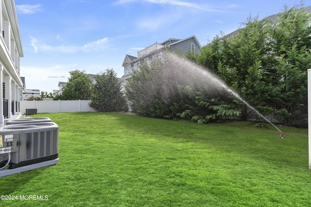 view of yard featuring central AC