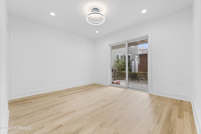 unfurnished room featuring light hardwood / wood-style flooring