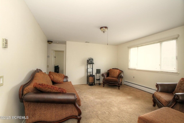 living area featuring a baseboard heating unit and light carpet