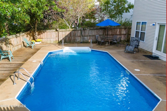 view of pool with a patio