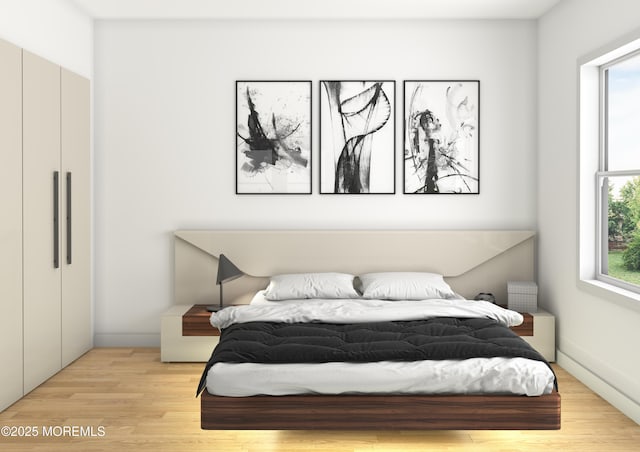 bedroom featuring light wood-type flooring