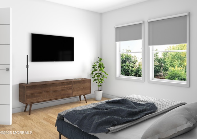 bedroom featuring light wood-type flooring